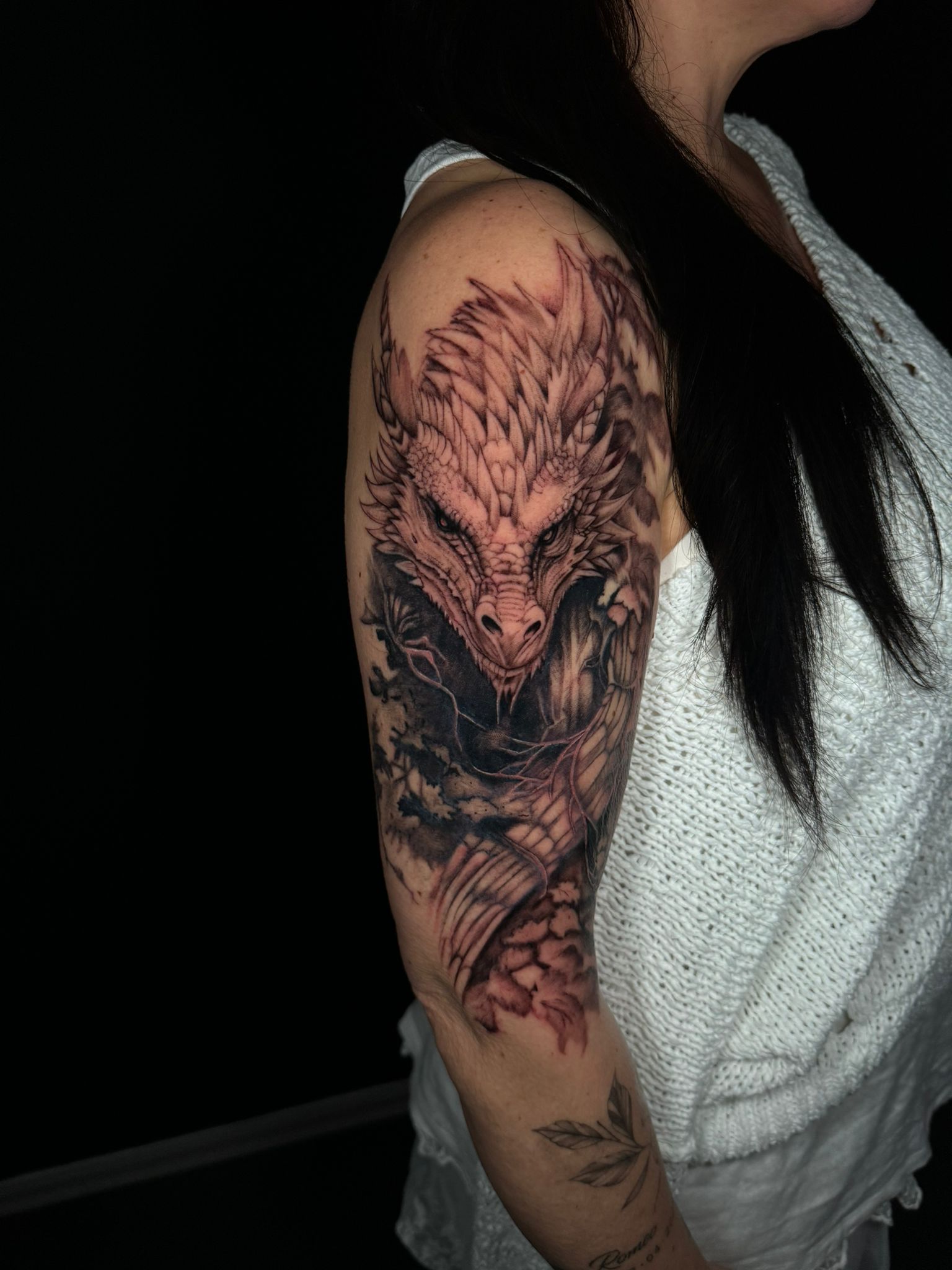 Drache Oberarm